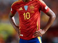 Lamine Yamal of Spain looks on during the UEFA Nations League 2024/25 League A Group A4 game between Spain and Denmark at Enrique Roca Stadi...