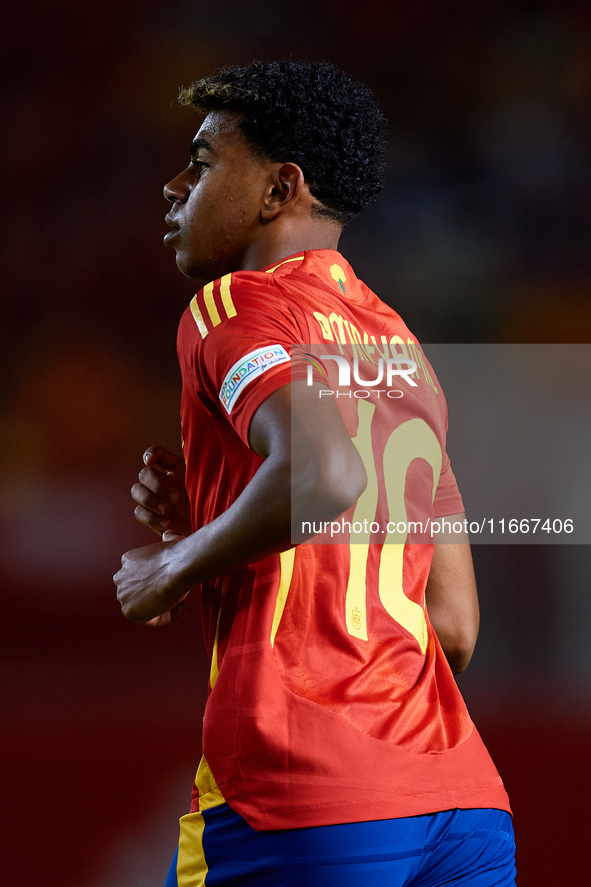 Lamine Yamal of Spain looks on during the UEFA Nations League 2024/25 League A Group A4 game between Spain and Denmark at Enrique Roca Stadi...