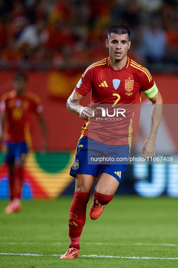 Alvaro Morata of Spain is in action during the UEFA Nations League 2024/25 League A Group A4 game between Spain and Denmark at Enrique Roca...