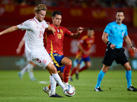 Martin Zubimendi of Spain competes for the ball with Hjulmand of Denmark during the UEFA Nations League 2024/25 League A Group A4 game betwe...