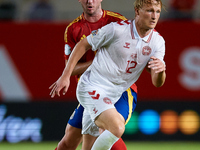 Dolberg (R) of Denmark competes for the ball with Aymeric Laporte of Spain during the UEFA Nations League 2024/25 League A Group A4 game bet...