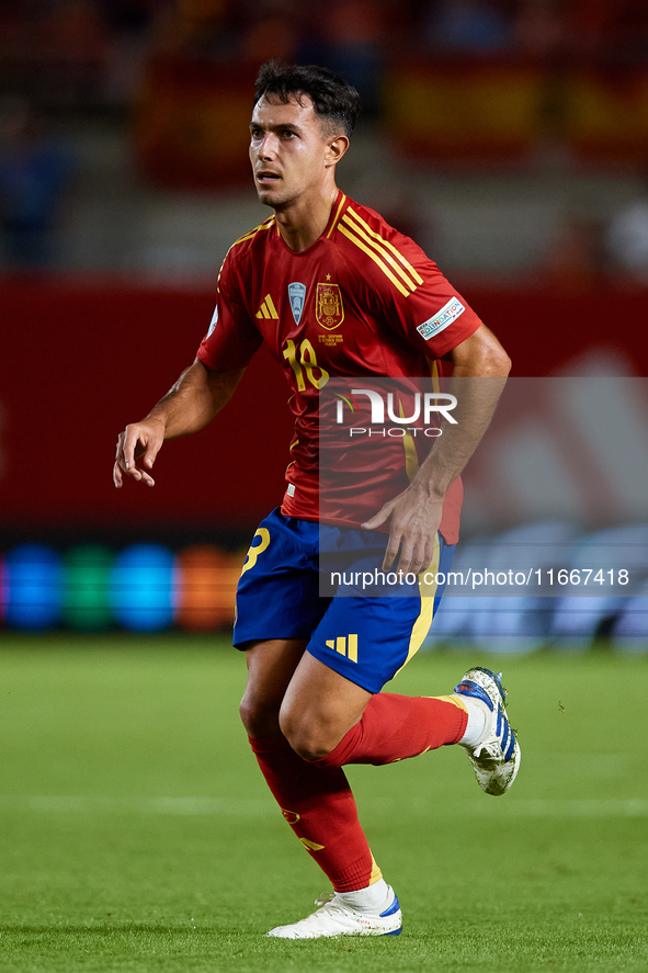 Martin Zubimendi of Spain is in action during the UEFA Nations League 2024/25 League A Group A4 game between Spain and Denmark at Enrique Ro...