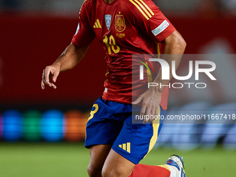 Martin Zubimendi of Spain is in action during the UEFA Nations League 2024/25 League A Group A4 game between Spain and Denmark at Enrique Ro...