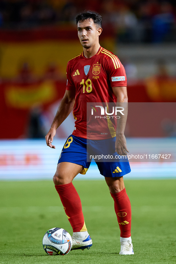 Martin Zubimendi of Spain is in action during the UEFA Nations League 2024/25 League A Group A4 game between Spain and Denmark at Enrique Ro...