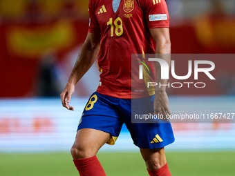 Martin Zubimendi of Spain is in action during the UEFA Nations League 2024/25 League A Group A4 game between Spain and Denmark at Enrique Ro...