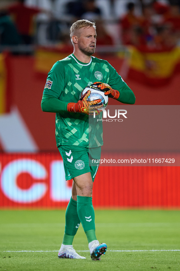 Kasper Schmeichel of Denmark holds the ball during the UEFA Nations League 2024/25 League A Group A4 game between Spain and Denmark at Enriq...