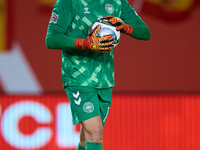 Kasper Schmeichel of Denmark holds the ball during the UEFA Nations League 2024/25 League A Group A4 game between Spain and Denmark at Enriq...