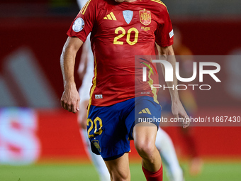 Pedri of Spain is in action during the UEFA Nations League 2024/25 League A Group A4 game between Spain and Denmark at Enrique Roca Stadium...