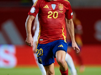 Pedri of Spain is in action during the UEFA Nations League 2024/25 League A Group A4 game between Spain and Denmark at Enrique Roca Stadium...