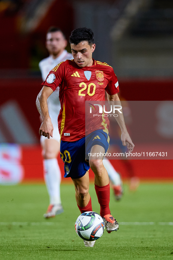 Pedri of Spain is in action during the UEFA Nations League 2024/25 League A Group A4 game between Spain and Denmark at Enrique Roca Stadium...