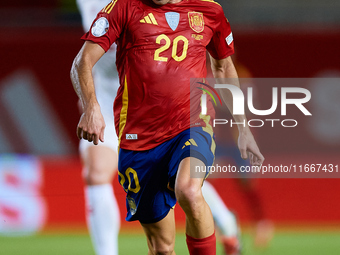 Pedri of Spain is in action during the UEFA Nations League 2024/25 League A Group A4 game between Spain and Denmark at Enrique Roca Stadium...