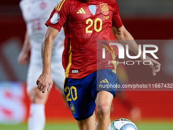 Pedri of Spain is in action during the UEFA Nations League 2024/25 League A Group A4 game between Spain and Denmark at Enrique Roca Stadium...