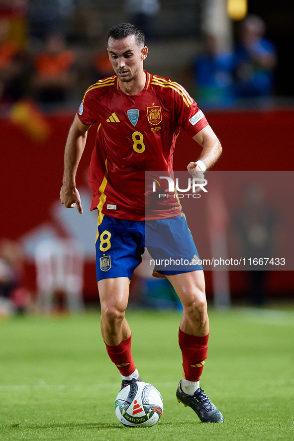 Fabian Ruiz of Spain is in action during the UEFA Nations League 2024/25 League A Group A4 game between Spain and Denmark at Enrique Roca St...