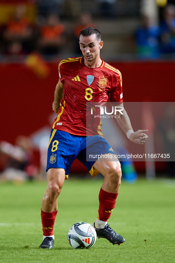 Fabian Ruiz of Spain is in action during the UEFA Nations League 2024/25 League A Group A4 game between Spain and Denmark at Enrique Roca St...