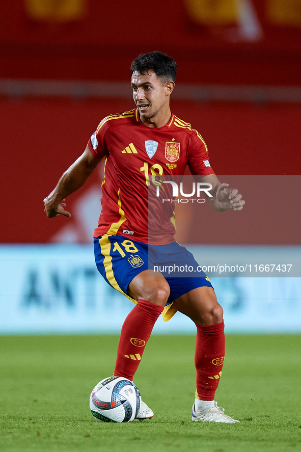 Martin Zubimendi of Spain is in action during the UEFA Nations League 2024/25 League A Group A4 game between Spain and Denmark at Enrique Ro...