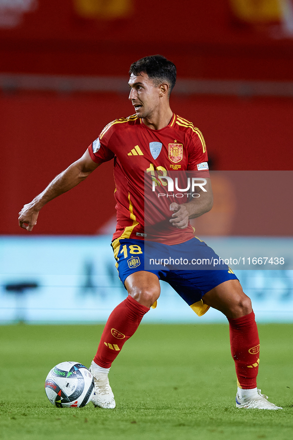 Martin Zubimendi of Spain is in action during the UEFA Nations League 2024/25 League A Group A4 game between Spain and Denmark at Enrique Ro...