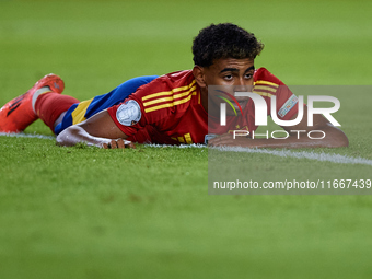 Lamine Yamal of Spain looks on during the UEFA Nations League 2024/25 League A Group A4 game between Spain and Denmark at Enrique Roca Stadi...