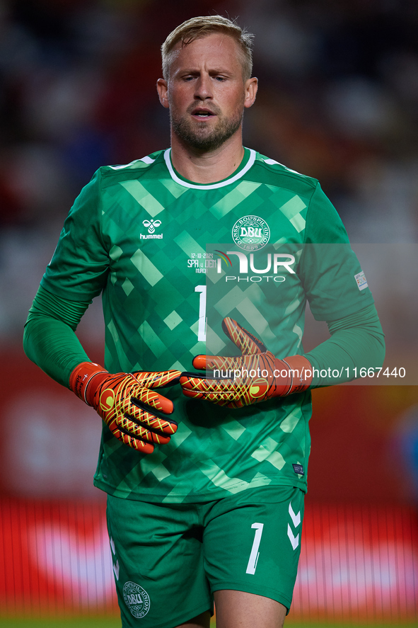 Kasper Schmeichel of Denmark looks on during the UEFA Nations League 2024/25 League A Group A4 game between Spain and Denmark at Enrique Roc...