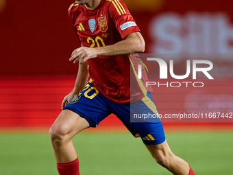 Pedri of Spain is in action during the UEFA Nations League 2024/25 League A Group A4 game between Spain and Denmark at Enrique Roca Stadium...