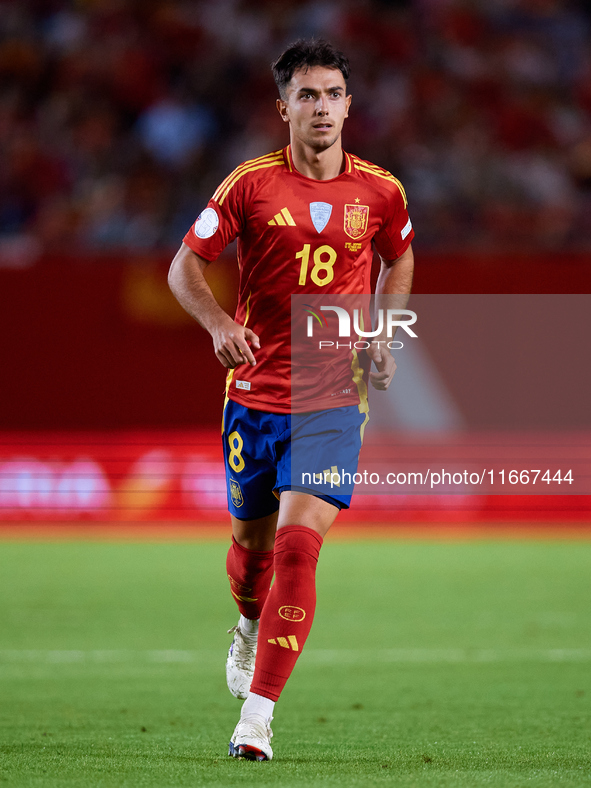 Martin Zubimendi of Spain is in action during the UEFA Nations League 2024/25 League A Group A4 game between Spain and Denmark at Enrique Ro...