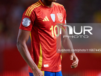 Lamine Yamal of Spain looks on during the UEFA Nations League 2024/25 League A Group A4 game between Spain and Denmark at Enrique Roca Stadi...