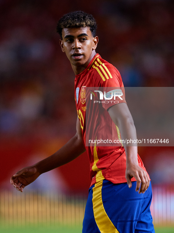 Lamine Yamal of Spain looks on during the UEFA Nations League 2024/25 League A Group A4 game between Spain and Denmark at Enrique Roca Stadi...