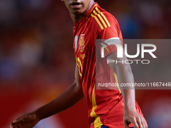 Lamine Yamal of Spain looks on during the UEFA Nations League 2024/25 League A Group A4 game between Spain and Denmark at Enrique Roca Stadi...