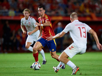 Fabian Ruiz of Spain competes for the ball with Rasmus Kristensen of Denmark during the UEFA Nations League 2024/25 League A Group A4 game b...