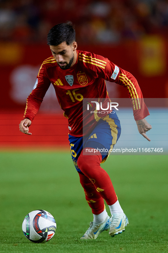 Alex Baena of Spain is in action during the UEFA Nations League 2024/25 League A Group A4 game between Spain and Denmark at Enrique Roca Sta...