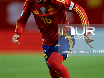 Alex Baena of Spain is in action during the UEFA Nations League 2024/25 League A Group A4 game between Spain and Denmark at Enrique Roca Sta...