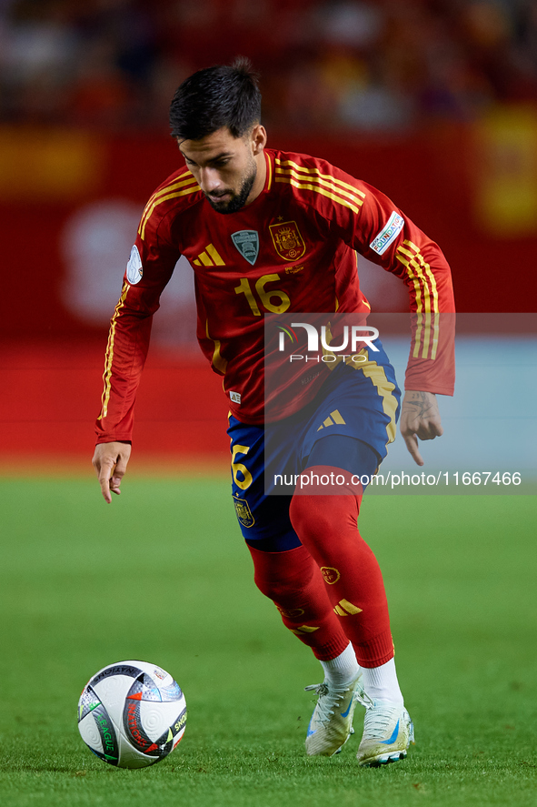 Alex Baena of Spain is in action during the UEFA Nations League 2024/25 League A Group A4 game between Spain and Denmark at Enrique Roca Sta...