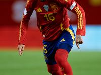 Alex Baena of Spain is in action during the UEFA Nations League 2024/25 League A Group A4 game between Spain and Denmark at Enrique Roca Sta...