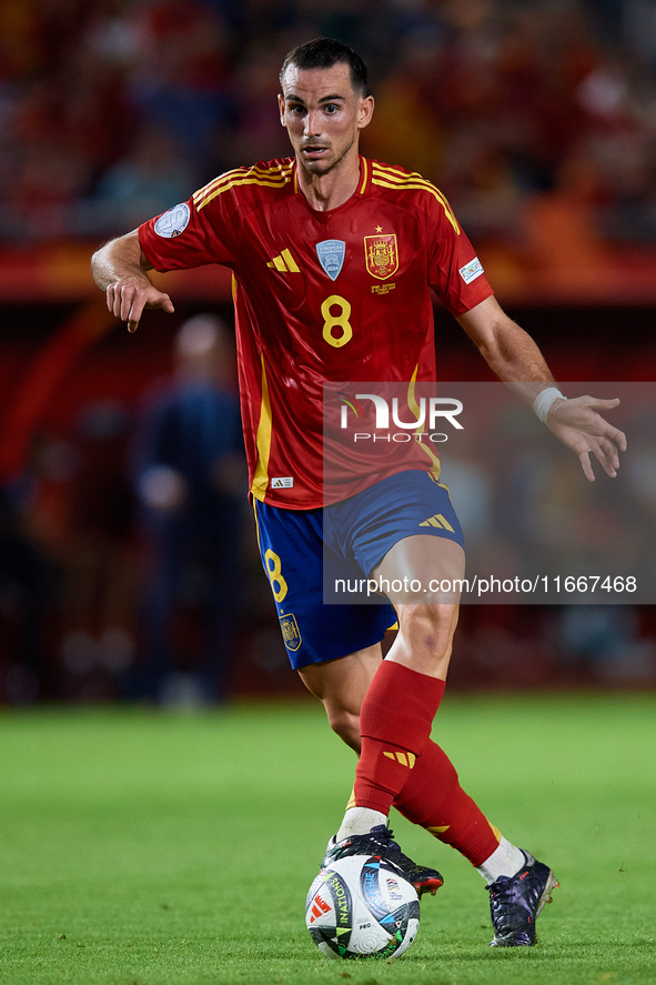 Fabian Ruiz of Spain is in action during the UEFA Nations League 2024/25 League A Group A4 game between Spain and Denmark at Enrique Roca St...