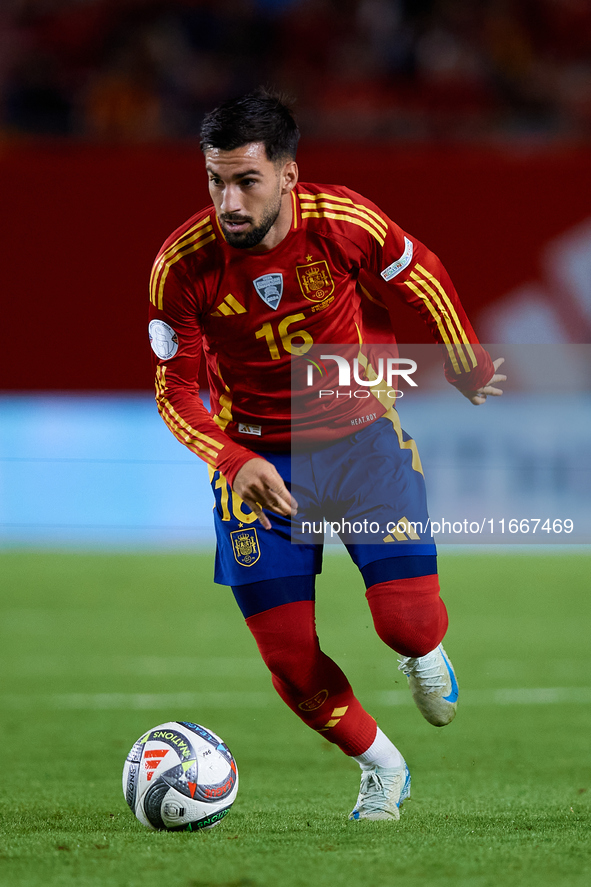 Alex Baena of Spain is in action during the UEFA Nations League 2024/25 League A Group A4 game between Spain and Denmark at Enrique Roca Sta...