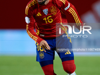 Alex Baena of Spain is in action during the UEFA Nations League 2024/25 League A Group A4 game between Spain and Denmark at Enrique Roca Sta...