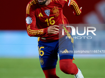 Alex Baena of Spain is in action during the UEFA Nations League 2024/25 League A Group A4 game between Spain and Denmark at Enrique Roca Sta...