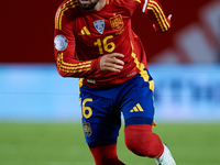 Alex Baena of Spain is in action during the UEFA Nations League 2024/25 League A Group A4 game between Spain and Denmark at Enrique Roca Sta...