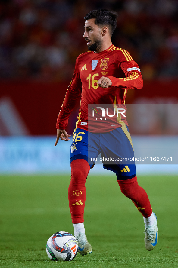 Alex Baena of Spain is in action during the UEFA Nations League 2024/25 League A Group A4 game between Spain and Denmark at Enrique Roca Sta...