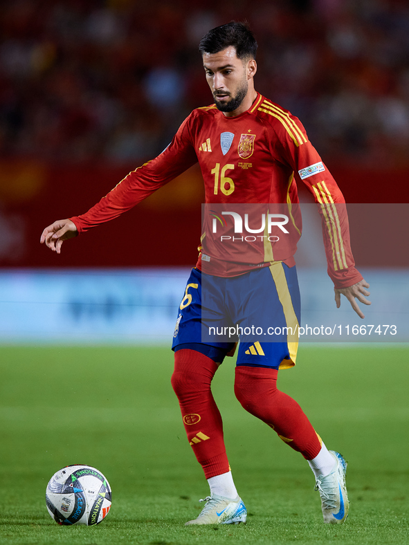 Alex Baena of Spain is in action during the UEFA Nations League 2024/25 League A Group A4 game between Spain and Denmark at Enrique Roca Sta...