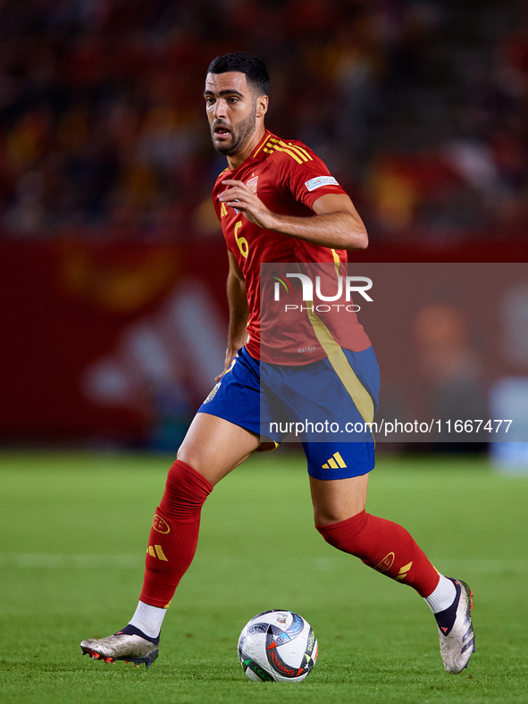 Mikel Merino of Spain is in action during the UEFA Nations League 2024/25 League A Group A4 game between Spain and Denmark at Enrique Roca S...