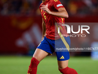 Mikel Merino of Spain is in action during the UEFA Nations League 2024/25 League A Group A4 game between Spain and Denmark at Enrique Roca S...