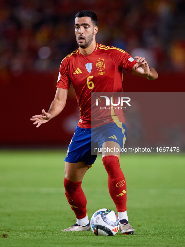 Mikel Merino of Spain is in action during the UEFA Nations League 2024/25 League A Group A4 game between Spain and Denmark at Enrique Roca S...