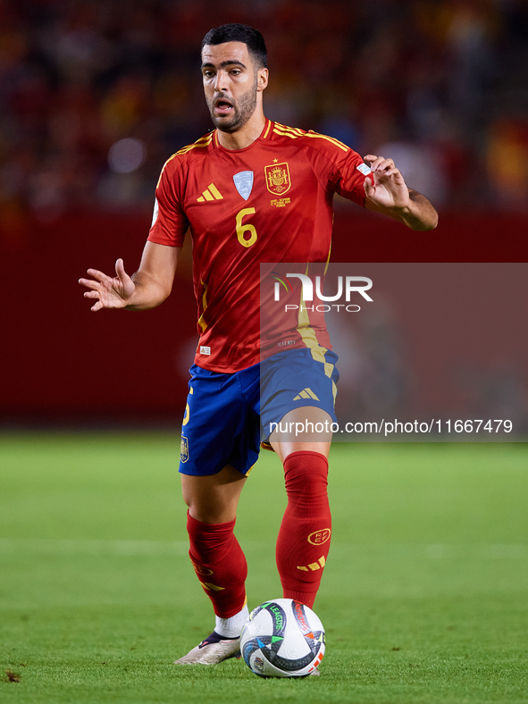 Mikel Merino of Spain is in action during the UEFA Nations League 2024/25 League A Group A4 game between Spain and Denmark at Enrique Roca S...