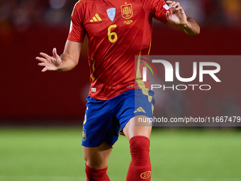 Mikel Merino of Spain is in action during the UEFA Nations League 2024/25 League A Group A4 game between Spain and Denmark at Enrique Roca S...