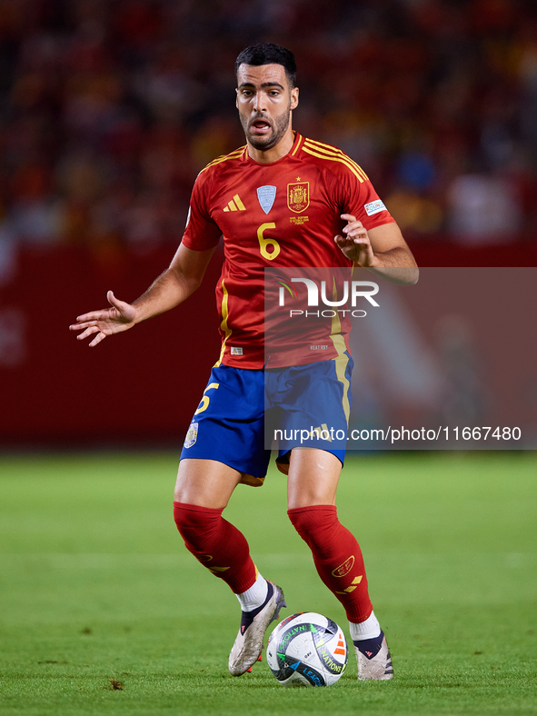 Mikel Merino of Spain is in action during the UEFA Nations League 2024/25 League A Group A4 game between Spain and Denmark at Enrique Roca S...