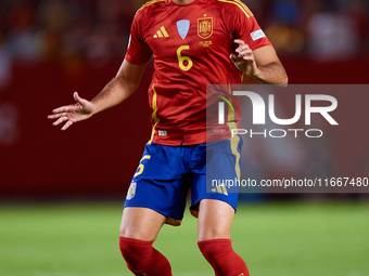 Mikel Merino of Spain is in action during the UEFA Nations League 2024/25 League A Group A4 game between Spain and Denmark at Enrique Roca S...