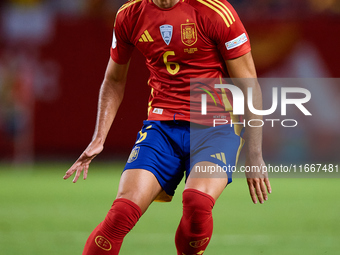 Mikel Merino of Spain is in action during the UEFA Nations League 2024/25 League A Group A4 game between Spain and Denmark at Enrique Roca S...