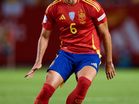 Mikel Merino of Spain is in action during the UEFA Nations League 2024/25 League A Group A4 game between Spain and Denmark at Enrique Roca S...