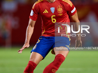 Mikel Merino of Spain is in action during the UEFA Nations League 2024/25 League A Group A4 game between Spain and Denmark at Enrique Roca S...