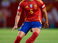 Mikel Merino of Spain is in action during the UEFA Nations League 2024/25 League A Group A4 game between Spain and Denmark at Enrique Roca S...